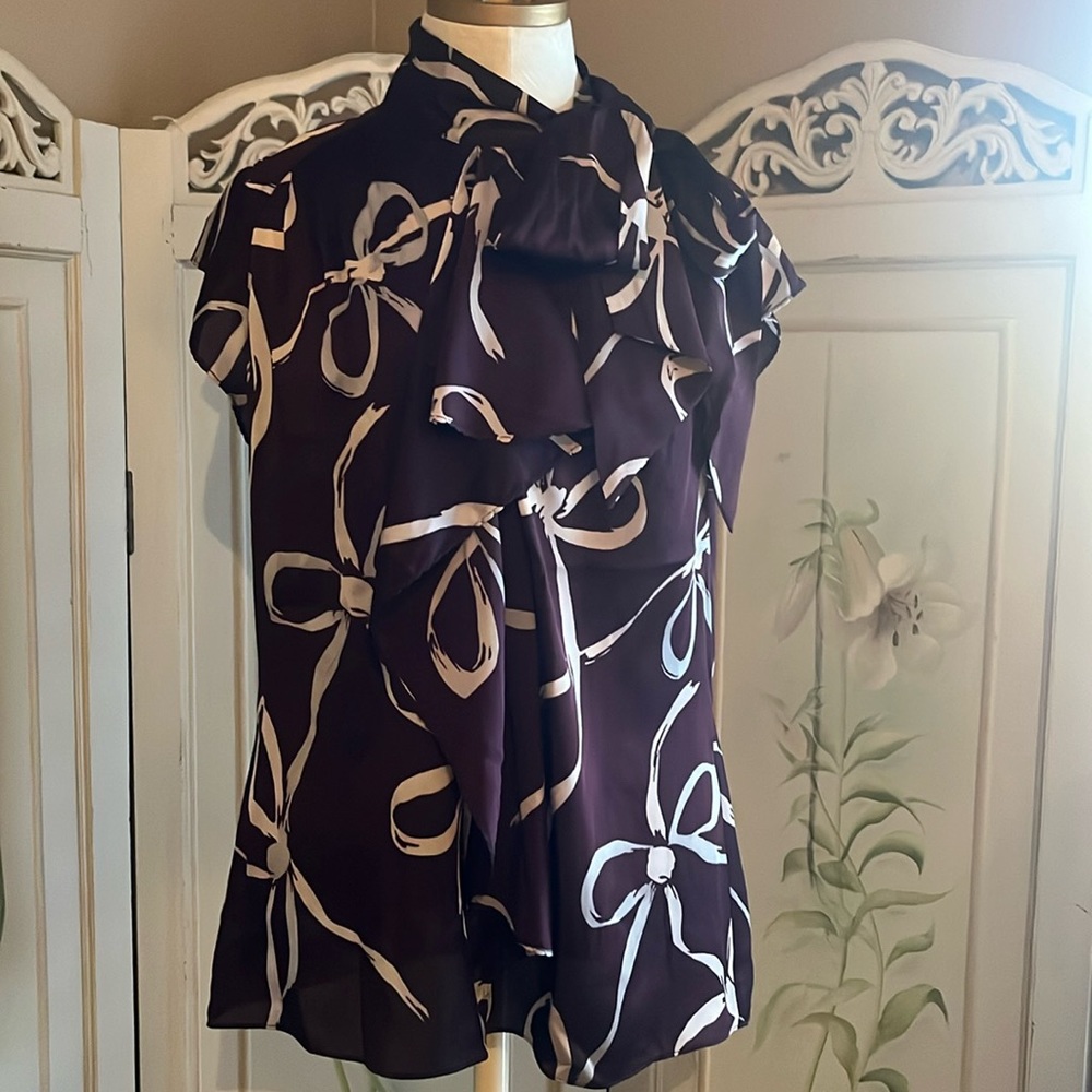 Ann Taylor silk blouse with tie buttons at neck and 95% silk plum and tan size M